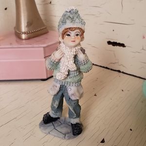 Vintage Little Boy In Winter With Patched Coat Figurine
